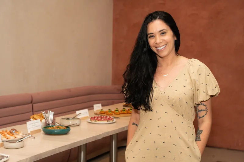 Allison Favis, Events Manager at Ash, in the dining room
